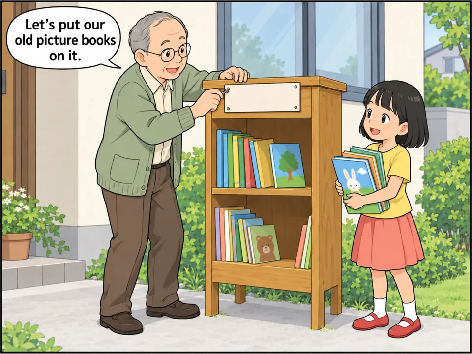 石井さん(高齢の男性)の家の前。石井さんが手作りの小さな本棚に「Free Books」の札をつけている。孫のメイが絵本を何冊も抱えて本棚に並べようとしている。 吹き出し:Let's put our old picture books on it.